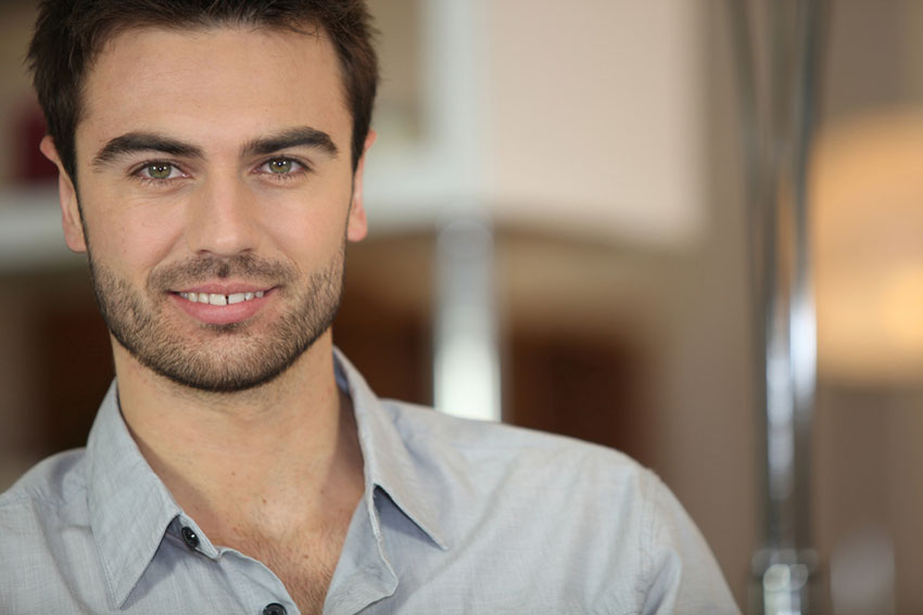 man with gap in front teeth